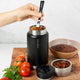 Ever Eco Insulated Food jar Onyx 800mll insulated food container with silver lid being used on a wooden surface with tomatoes and herbs.