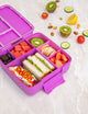 MontiiCo Feast Lunch Box - Fuchsia flatlay with snacks