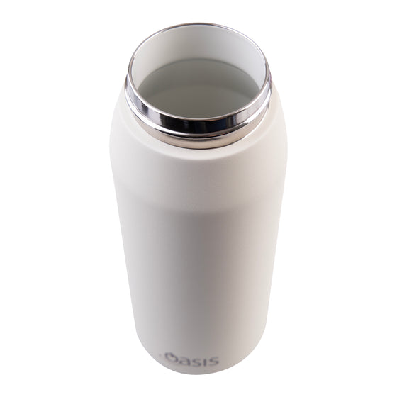 Oasis Ceramic Lined Stainless Steel Capri Drink Bottle 750ml cream bottle close-up showing wide mouth, stainless rim and ceramic-lined interior.