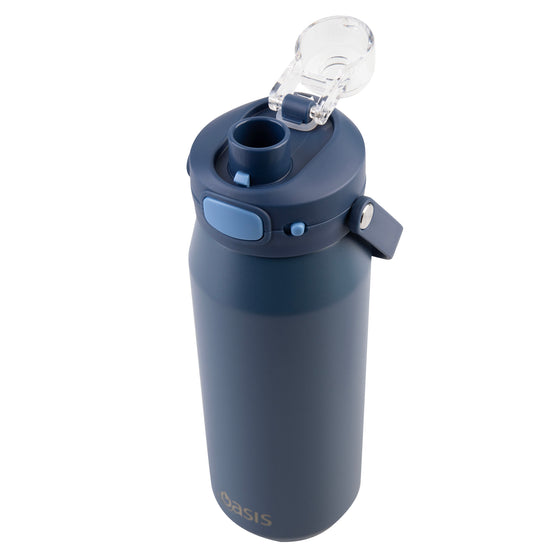 Oasis Ceramic Lined Stainless Steel Capri Drink Bottle 750ml navy bottle angled close-up with open clear flip cap, drinking spout and side carry strap.