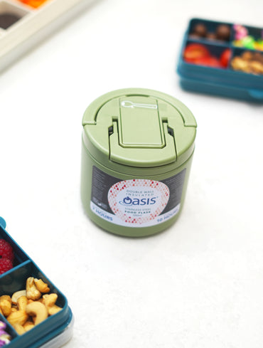 Oasis insulated food jar 550ml olive green on white benchtop.