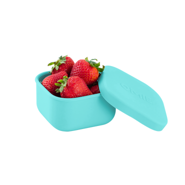 Omie snack silicone container teal colour with strawberries